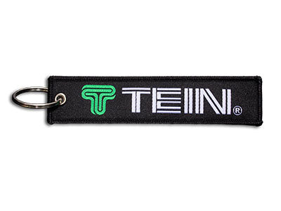 Black TEIN flight tag keychain (TN016-019).
